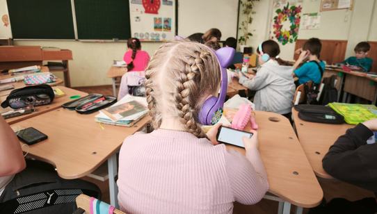 Ukrainian students engage with the Can't Wait to Learn app in their classroom