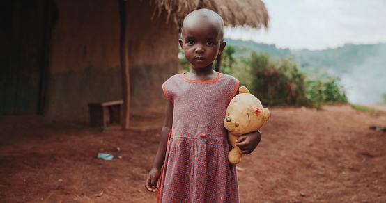 War Child Ugandan girl with teddy bear in hands_War Child Uganda_190914.jpg