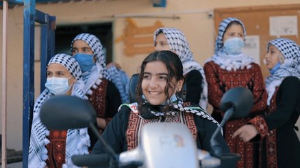 Alaa with her friends during one or War Child Psychosocial activities in Gaza