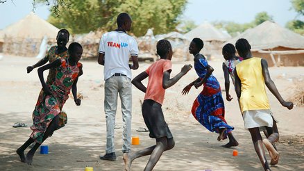 Children playing together during a War Child's TeamUp session