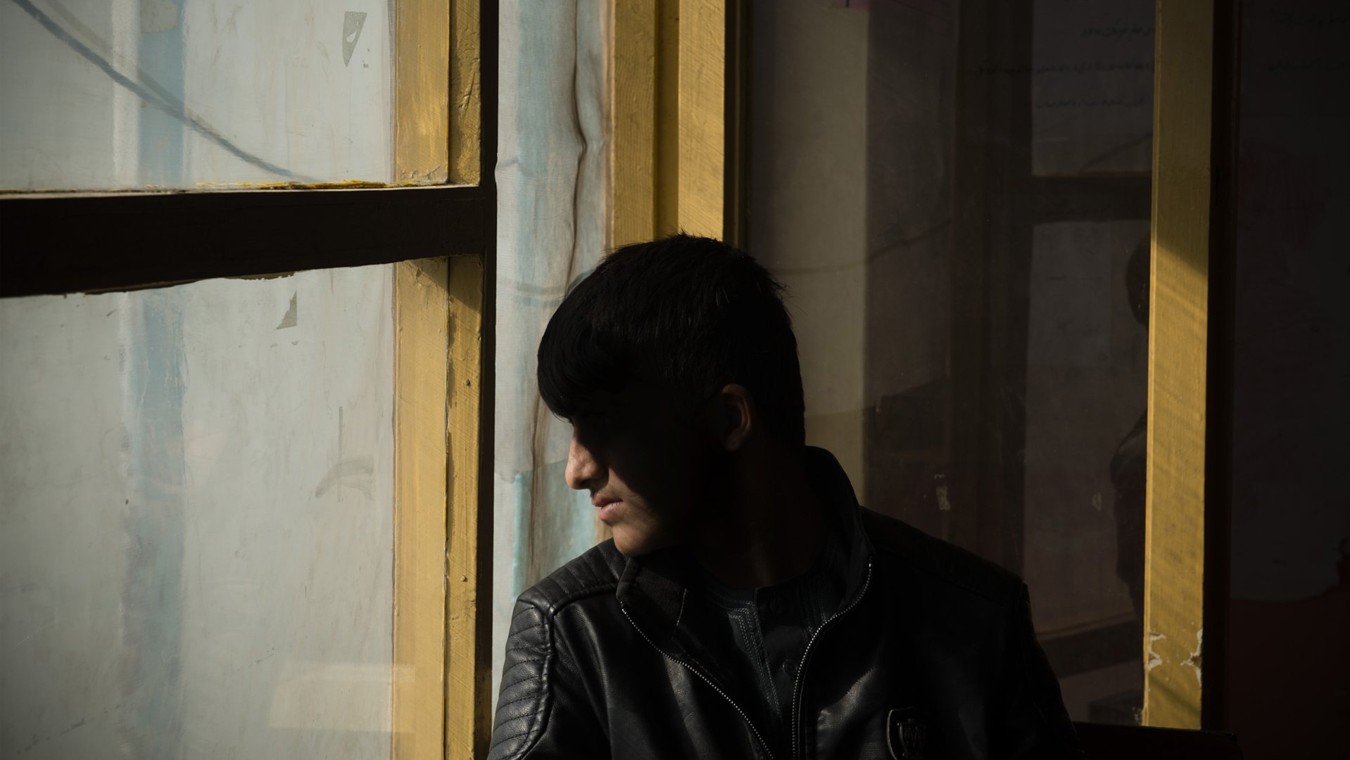 War Child in Afghanistan - boy in shadow - unknown