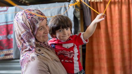 Mother and baby daughter from Syria now in refugee camp in Jordan - War Child