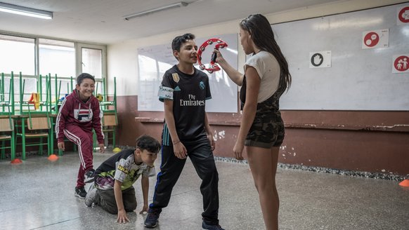Venezuelan children playing  at TeamUp_War Child Colombia_190315