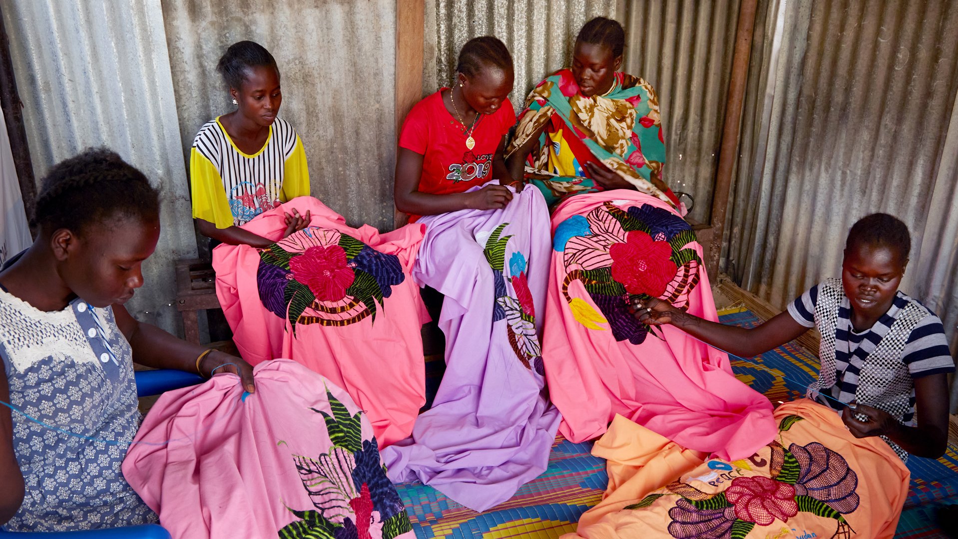 Group of South Sudanese girls stitching_War Child_200303