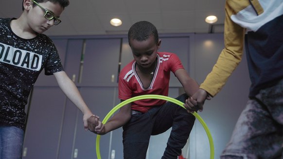 Children can become a child again, playing the activities of TeamUp at School with War Child